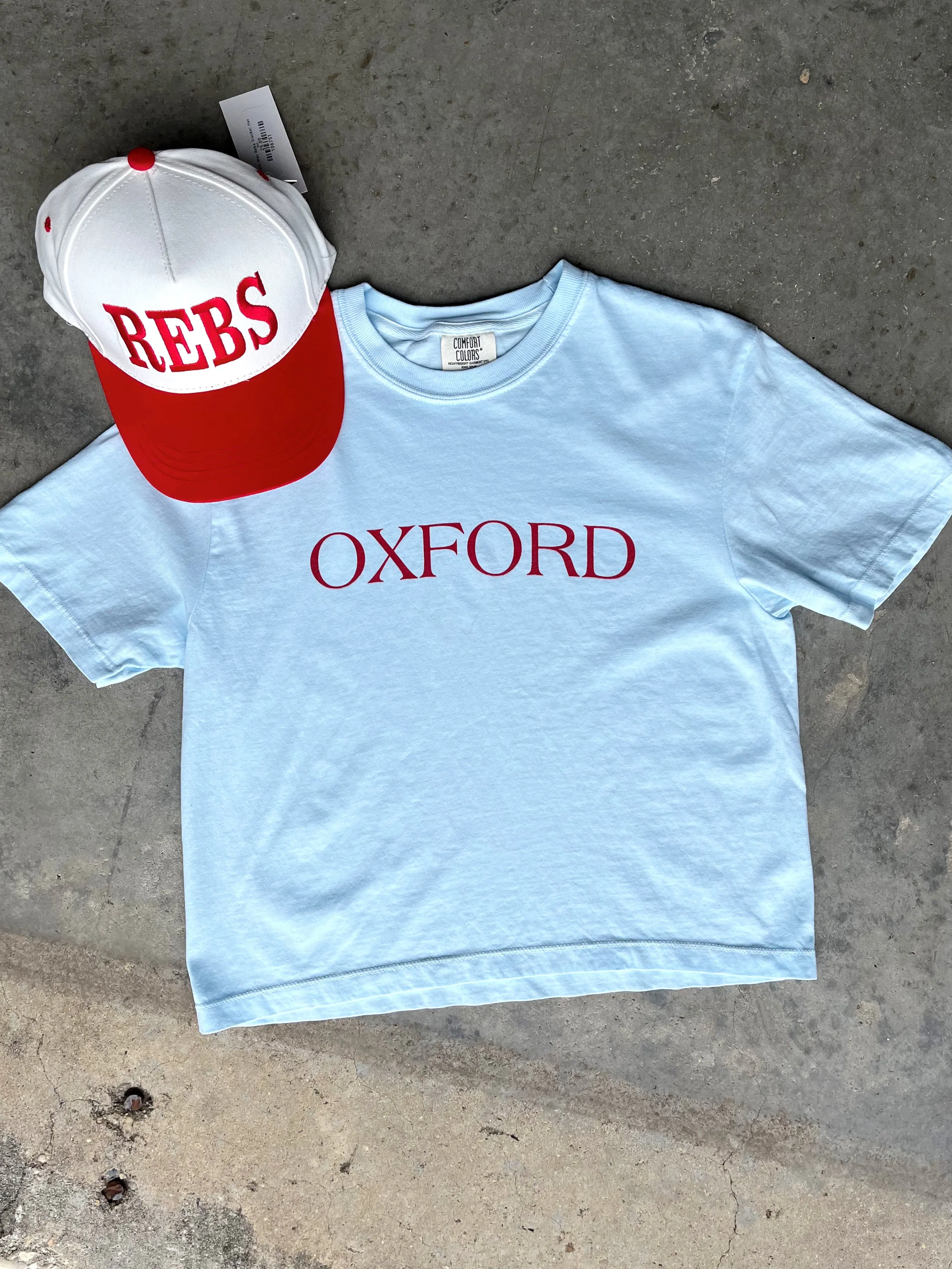 Oxford Graphic Top sold by Bella Rose boutique