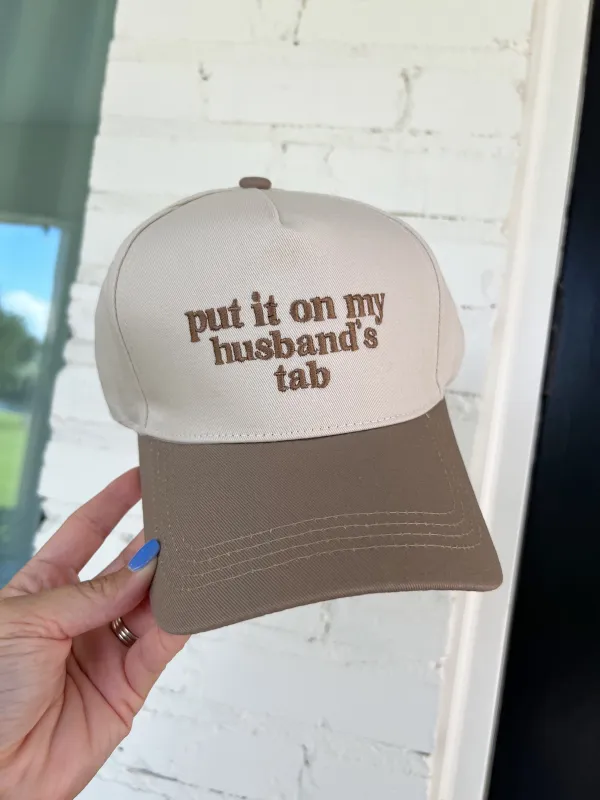 Put It On My Husband's Tab Trucker Hat sold by Bella Rose boutique