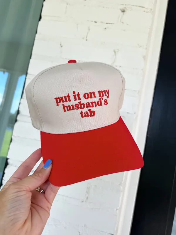 Put It On My Husband's Tab Trucker Hat sold by Bella Rose boutique