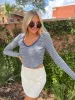 Let's Get To Business Skort sold by Bella Rose boutique