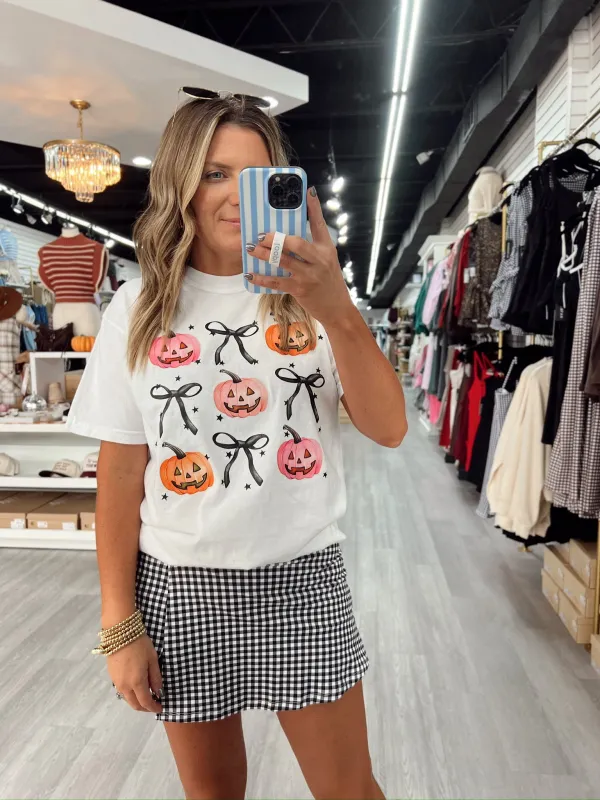 Posh Pumpkins and Bows Graphic Top sold by Bella Rose boutique