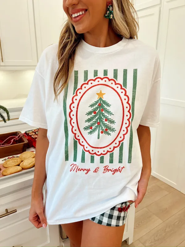 Merry And Bright Christmas Graphic Top sold by Bella Rose boutique