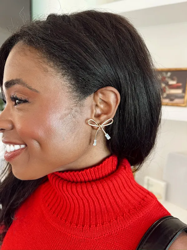 Gold Bow Earrings With Baguette Rhinestone sold by Bella Rose boutique