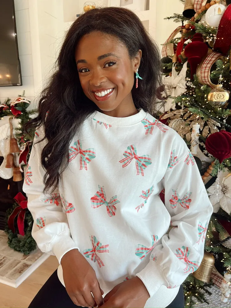Christmas Bow Pullover Sweater sold by Bella Rose boutique