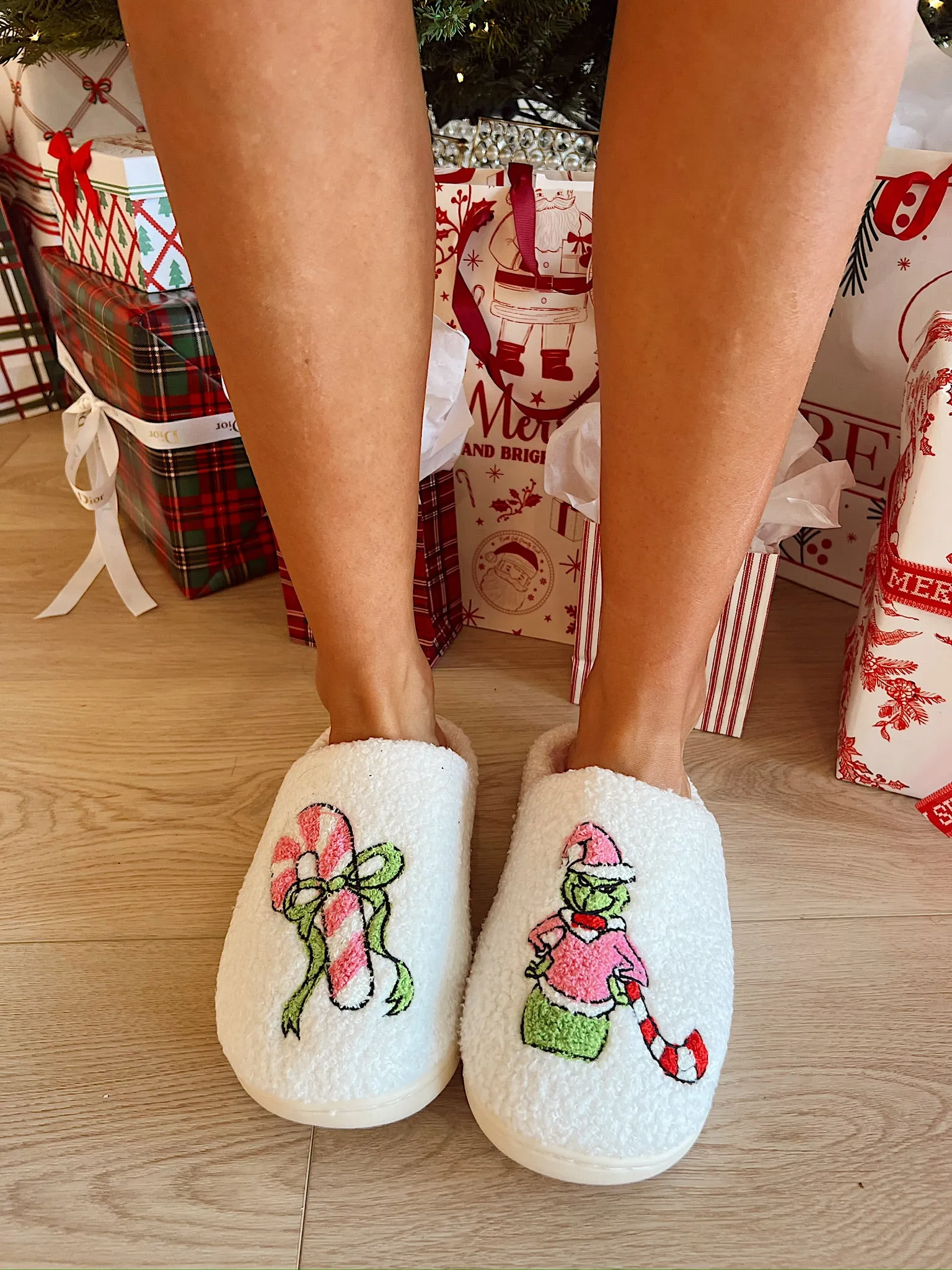 The Green Christmas Monster Slippers sold by Bella Rose boutique