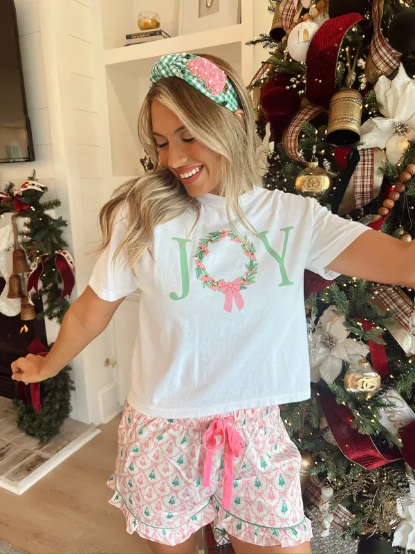 Joy Wreath Christmas Graphic Top sold by Bella Rose boutique
