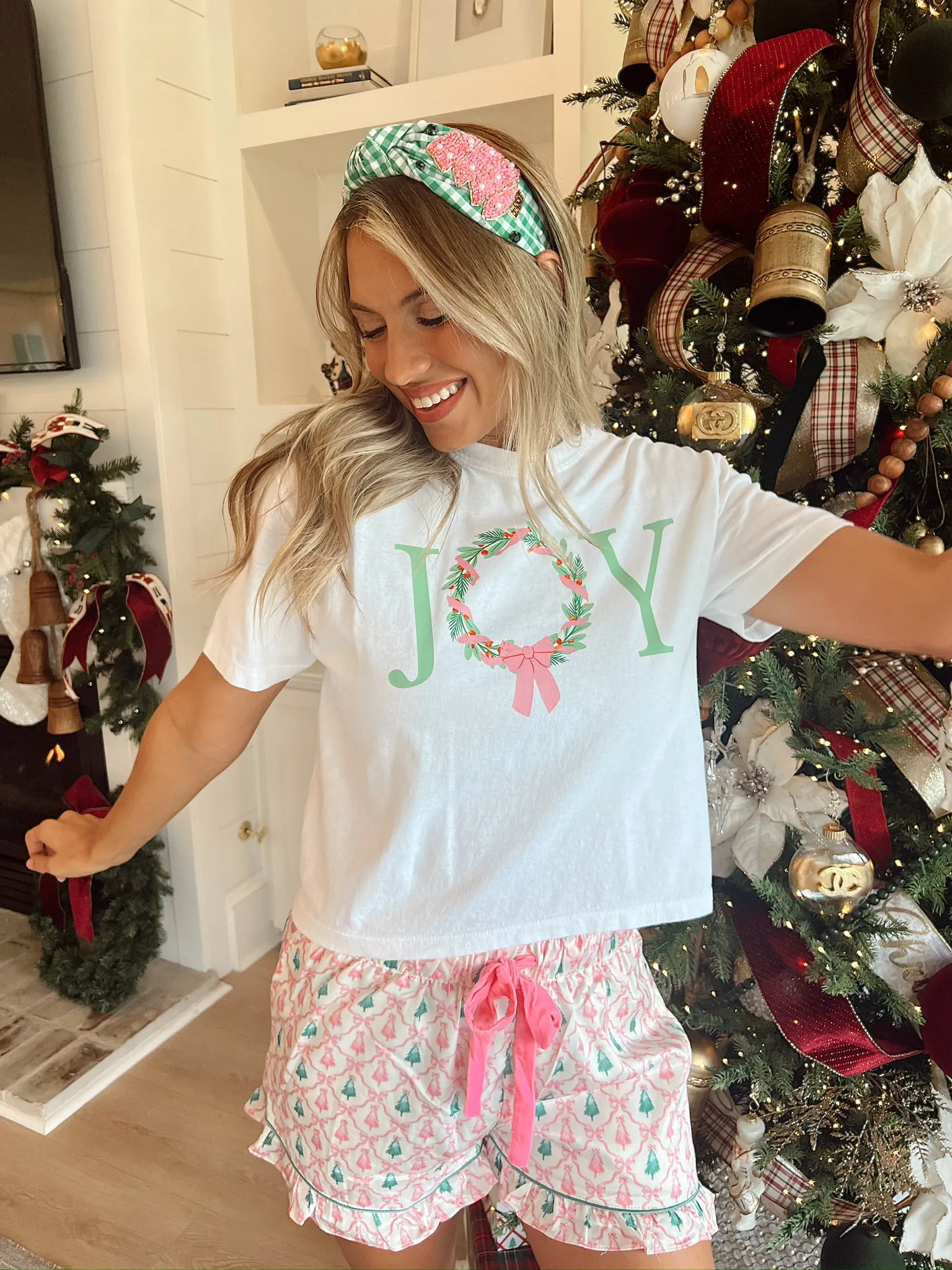 Joy Wreath Christmas Graphic Top sold by Bella Rose boutique