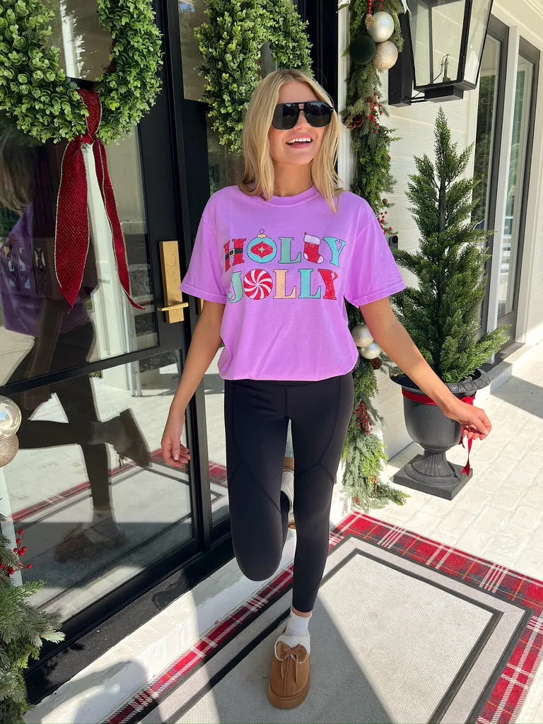 Holly Jolly Graphic Top sold by Bella Rose boutique