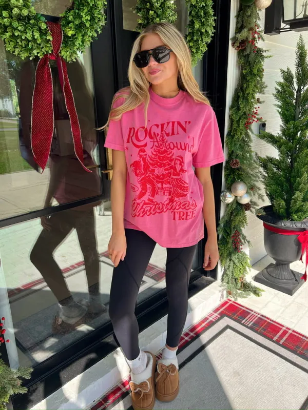 Rocking Around The Christmas Tree Graphic Top sold by Bella Rose boutique