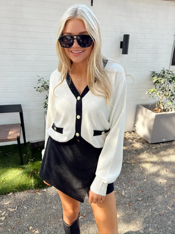 Making Headlines Cardigan sold by Bella Rose boutique