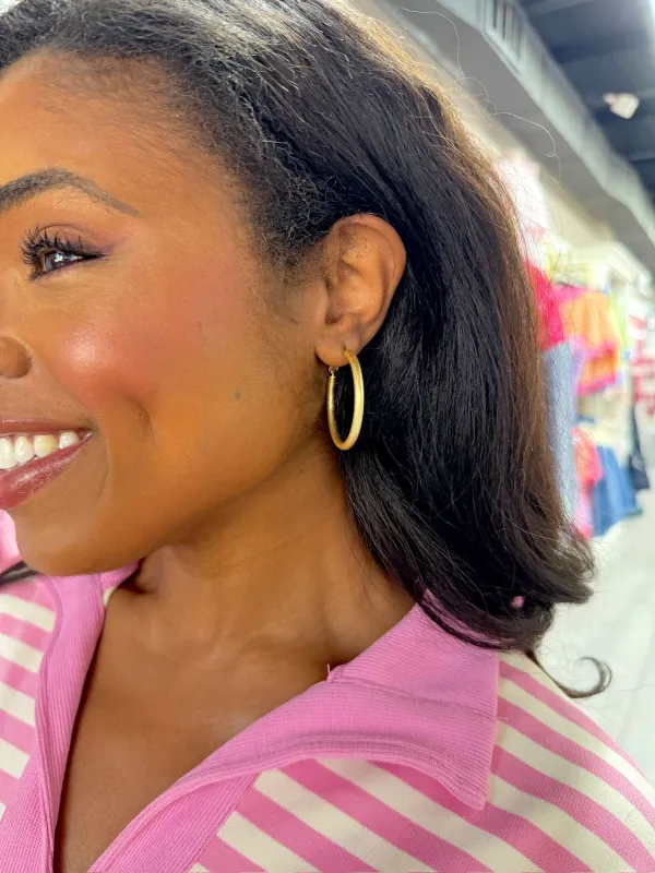 1.5" Tube Hoop Earrings made by Fame