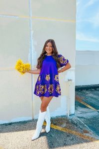 The Tiger Sequin Dress sold by Bella Rose boutique