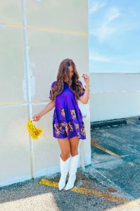 The Tiger Sequin Dress sold by Bella Rose boutique