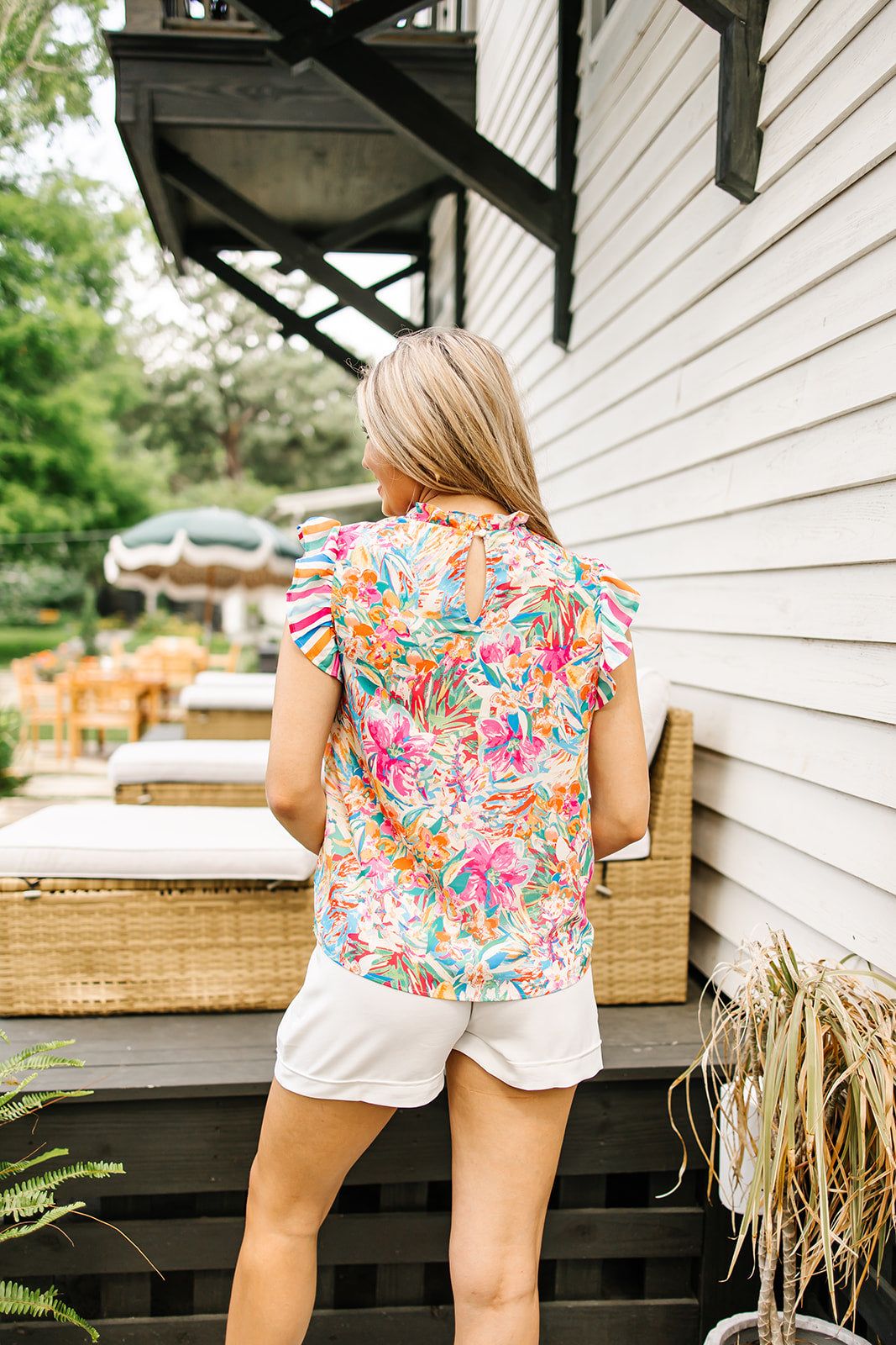 Rainbow Eyes Floral Top sold by Bella Rose boutique product image thumbnail 4