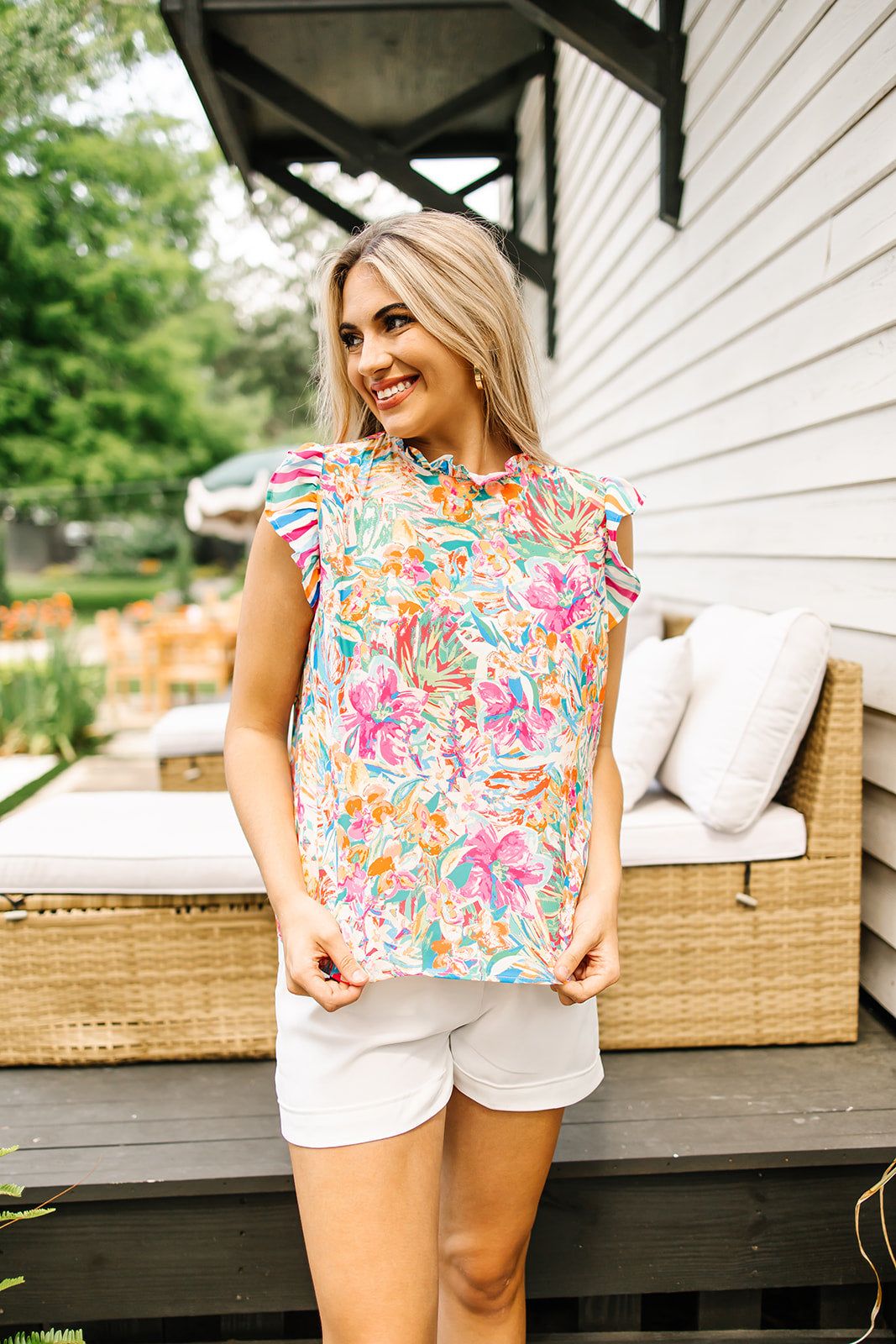 Rainbow Eyes Floral Top sold by Bella Rose boutique product image thumbnail 2