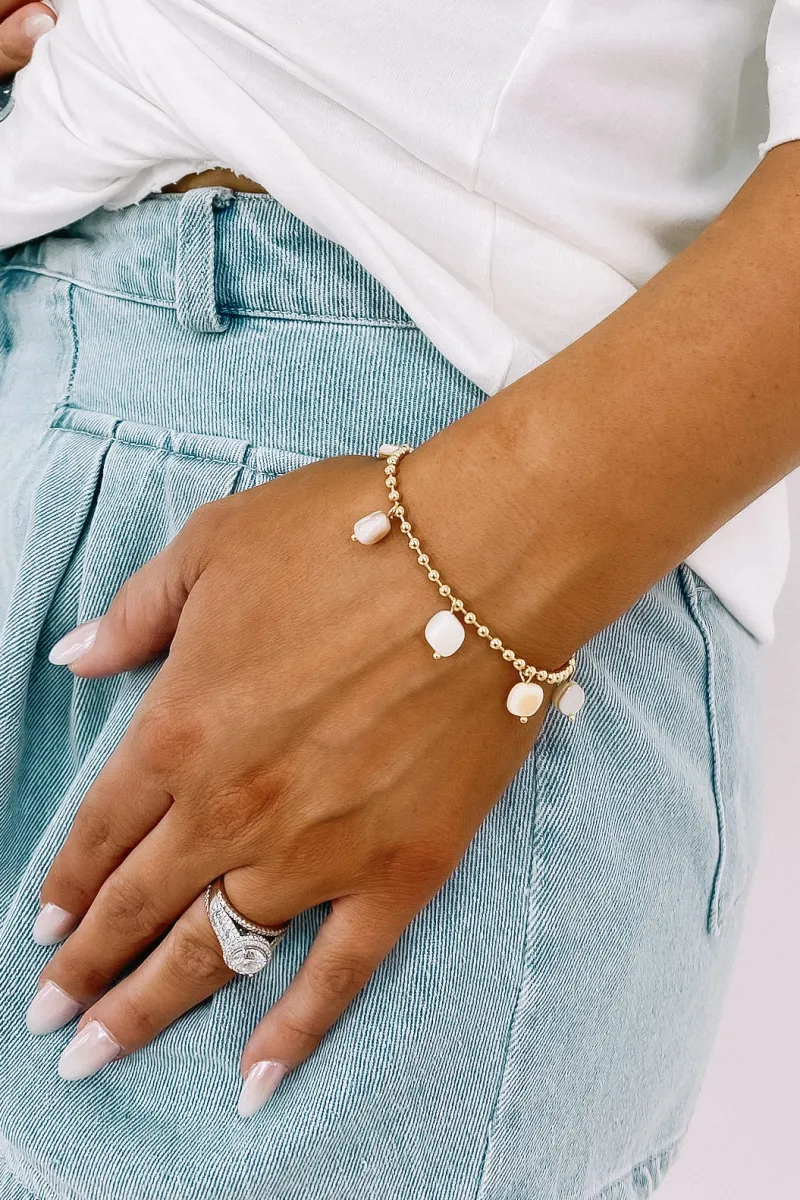 Bring You Cheer Pearly Charm Bracelet sold by Bella Rose boutique