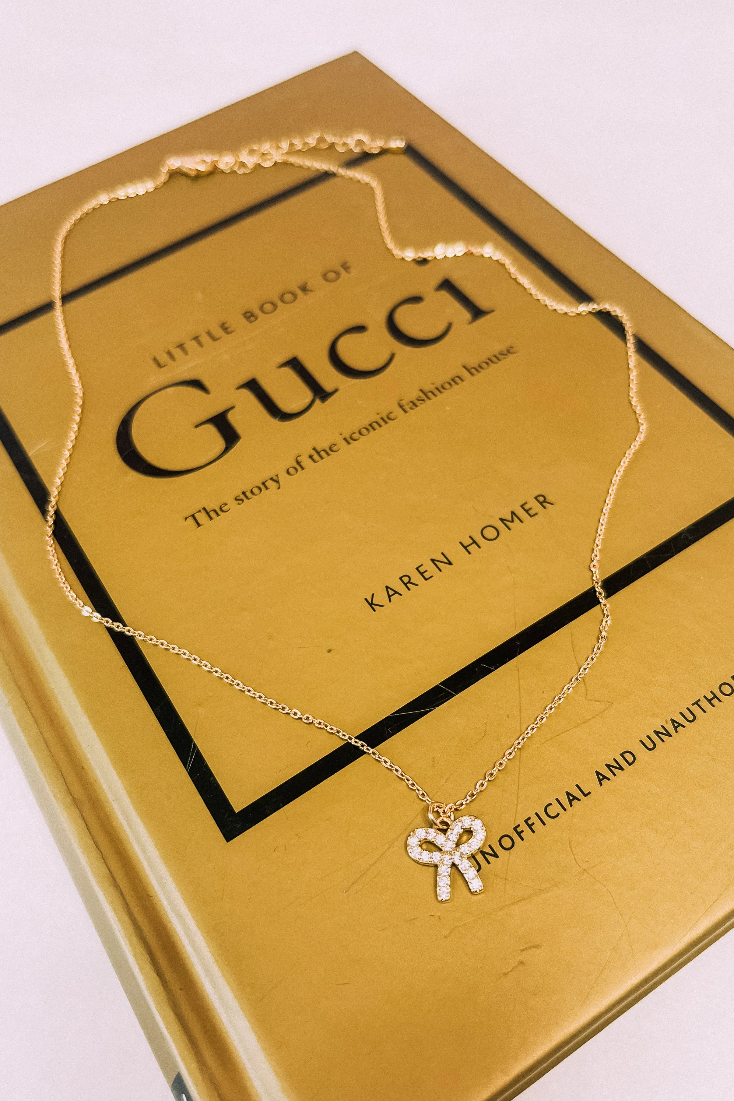 Bow Babes Rhinestone Necklace sold by Bella Rose boutique