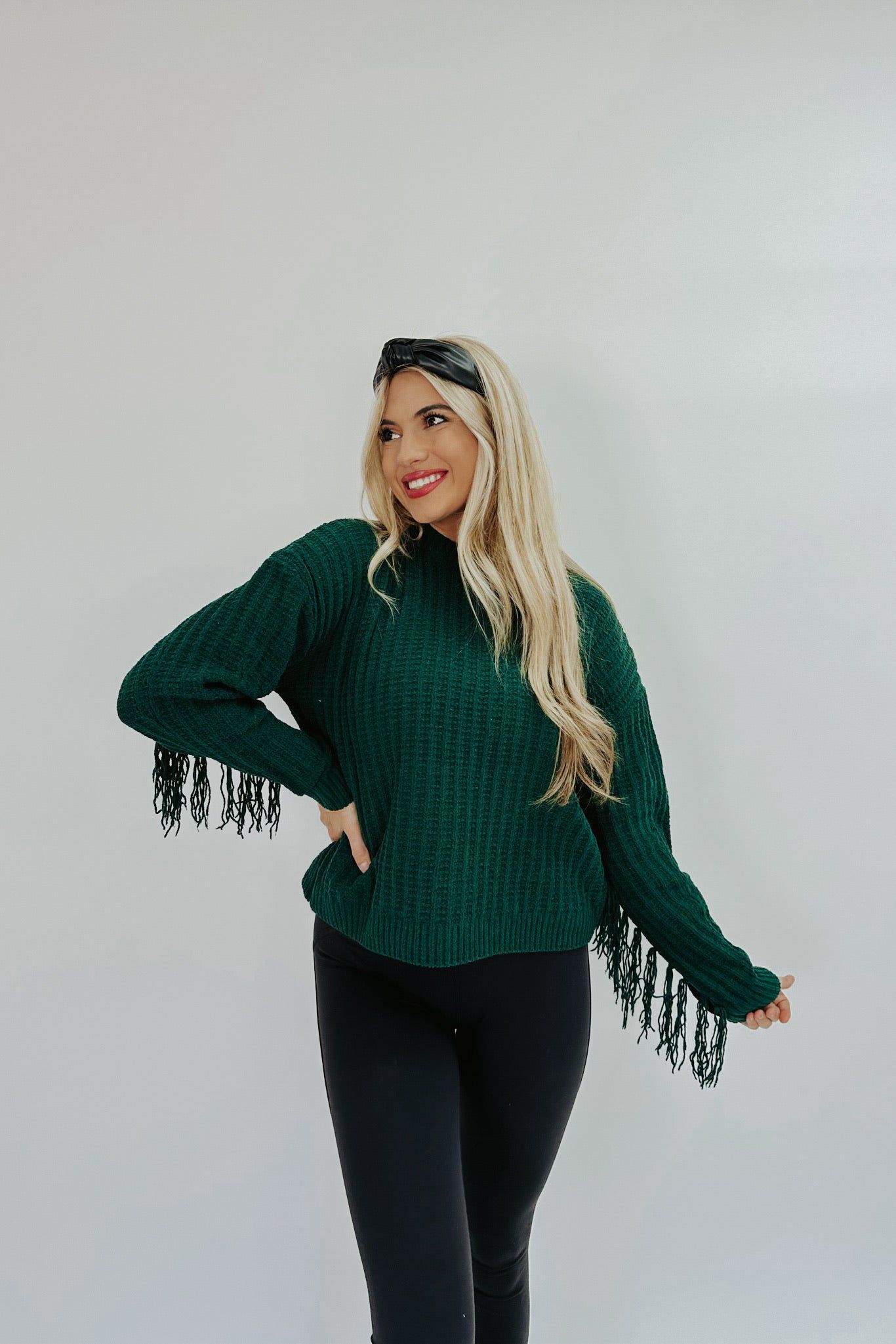 Definitely Not Average Fringe Sweater sold by Bella Rose boutique