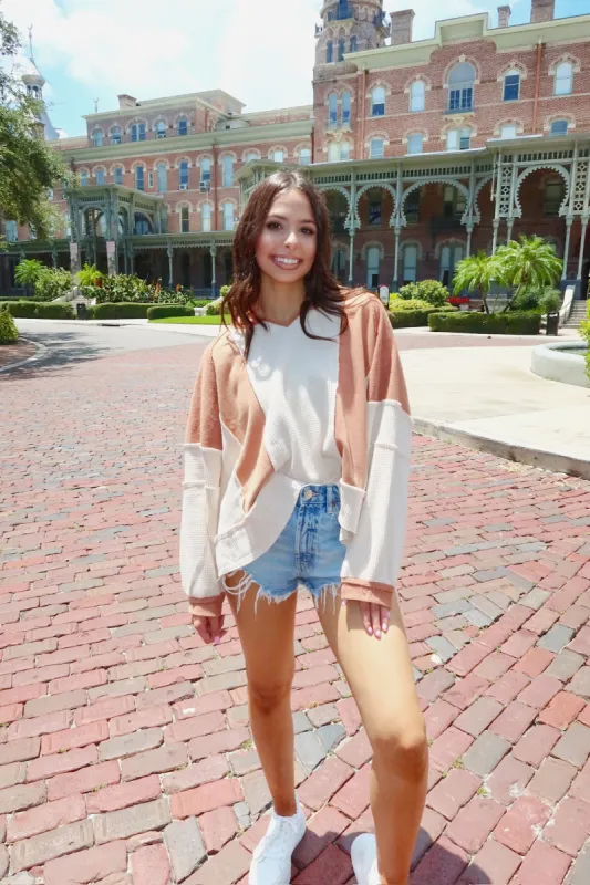 Unique & Interesting Oversized Top sold by Bella Rose boutique