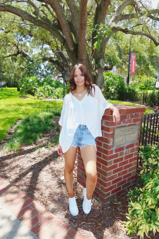 Cheerful Charm Oversized Top sold by Bella Rose boutique