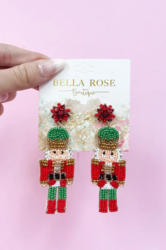 Red Nutcracker Seed Bead Drop Earrings sold by Bella Rose boutique