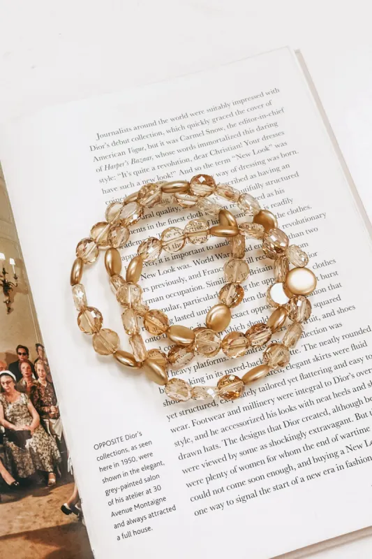 3 Piece Gold Flat Round Bead Stretch Bracelet Set sold by Bella Rose boutique
