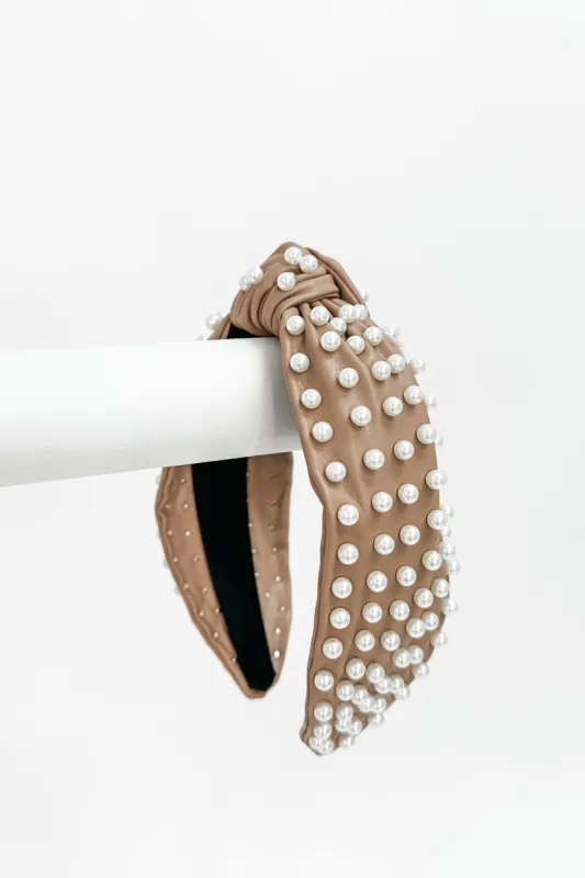 The "Thick Pearl" Knot Headband sold by Bella Rose boutique