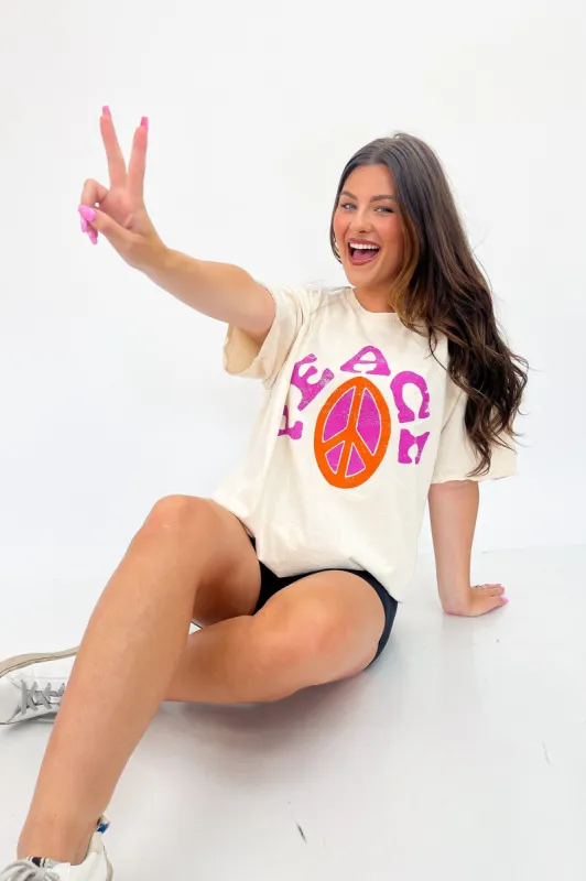 LivyLu Peace Sign Distressed Tee sold by Bella Rose boutique