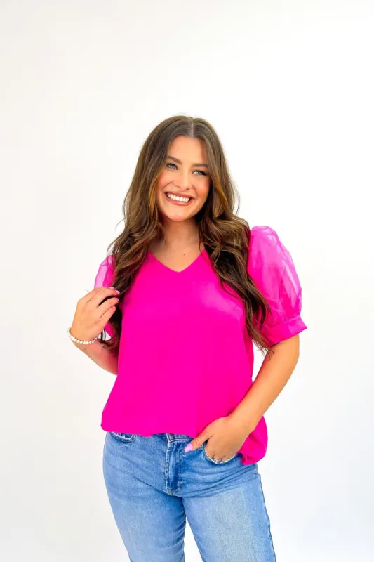 Blooming Poppies Blouse sold by Bella Rose boutique
