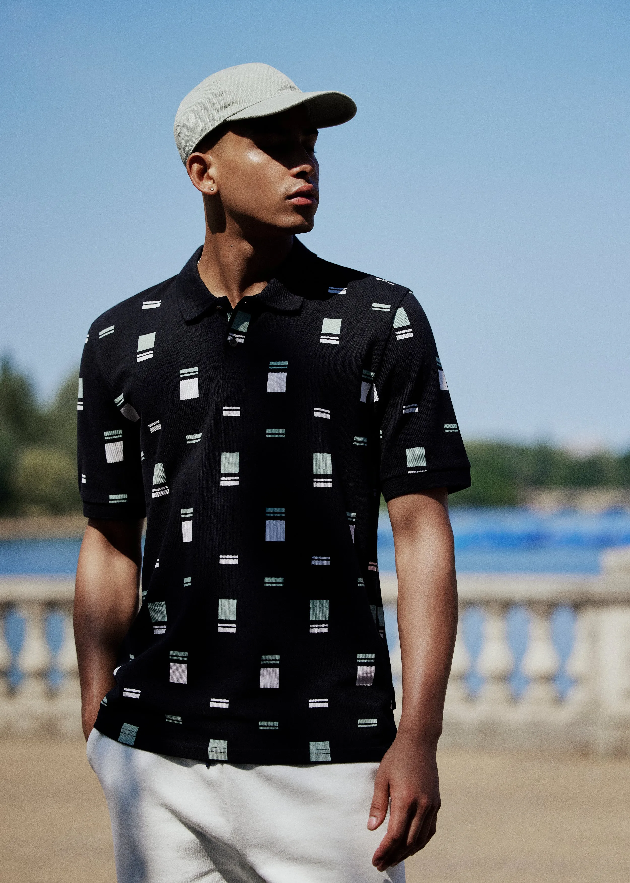 B by Ben Sherman Scatter Chequerboard Mod Stripe Polo - Black sold by Ben Sherman