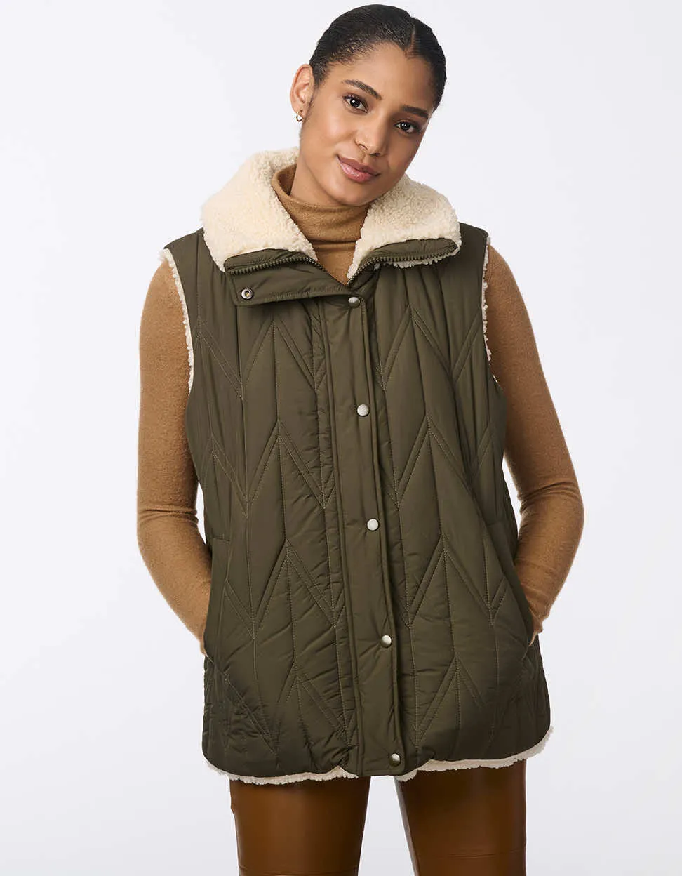 Dual Charm Sherpa Vest sold by Bernardo