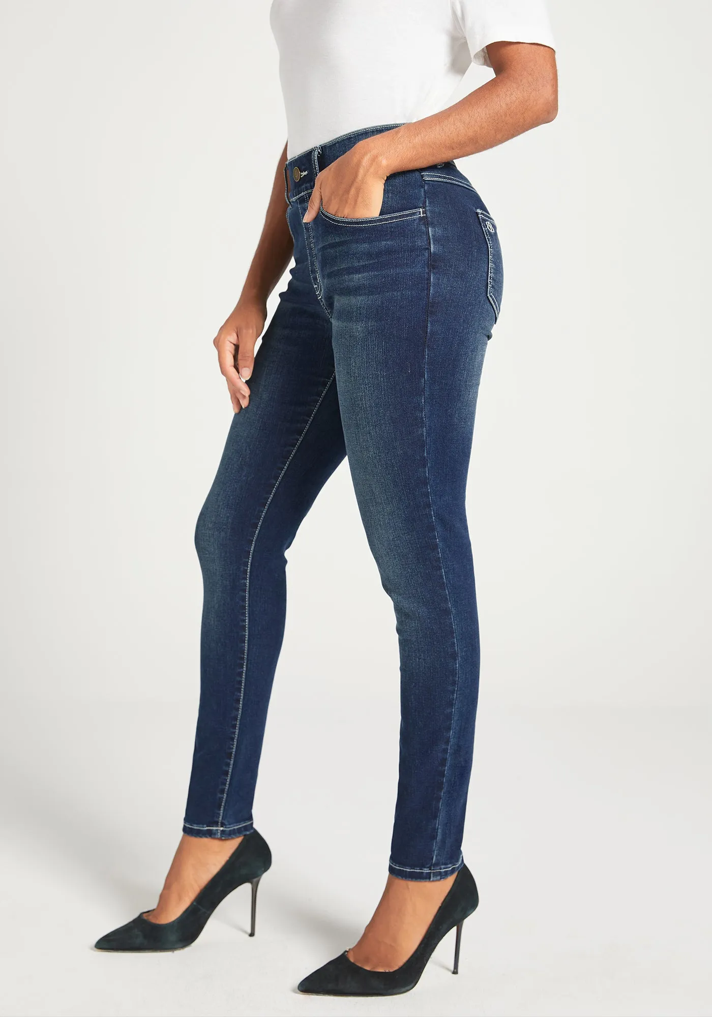 Signature Mid-Rise Denim | Skinny (Roma Wash) sold by Betabrand