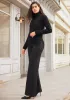 SoftBlend Merino Turtleneck (Black) sold by Betabrand