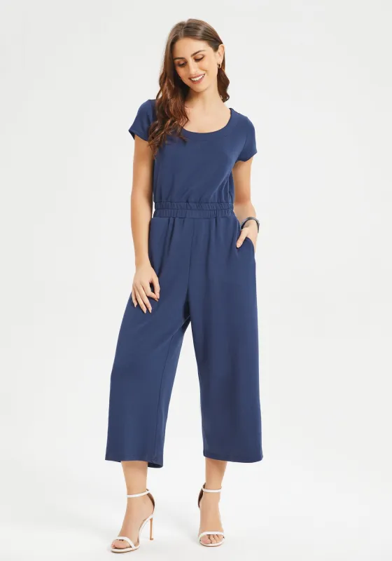 AirFlex Short Sleeve Jumpsuit (Navy) sold by Betabrand