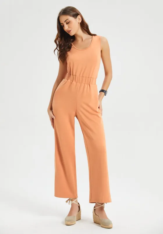 AirFlex Sleeveless Jumpsuit (Rust) sold by Betabrand