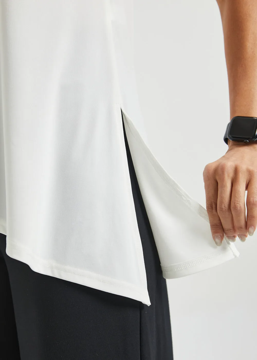 Asymmetrical Hem Sleeveless Tunic | Matte Jersey (Ivory) sold by Betabrand product image thumbnail 4
