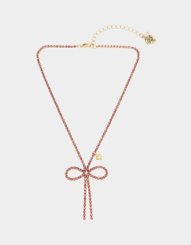 BOW PENDANT PINK sold by Betsey Johnson