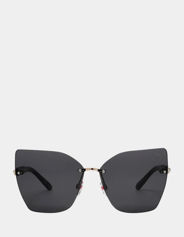 BETSEYS PEARL EDGE SUNNIES BLACK sold by Betsey Johnson