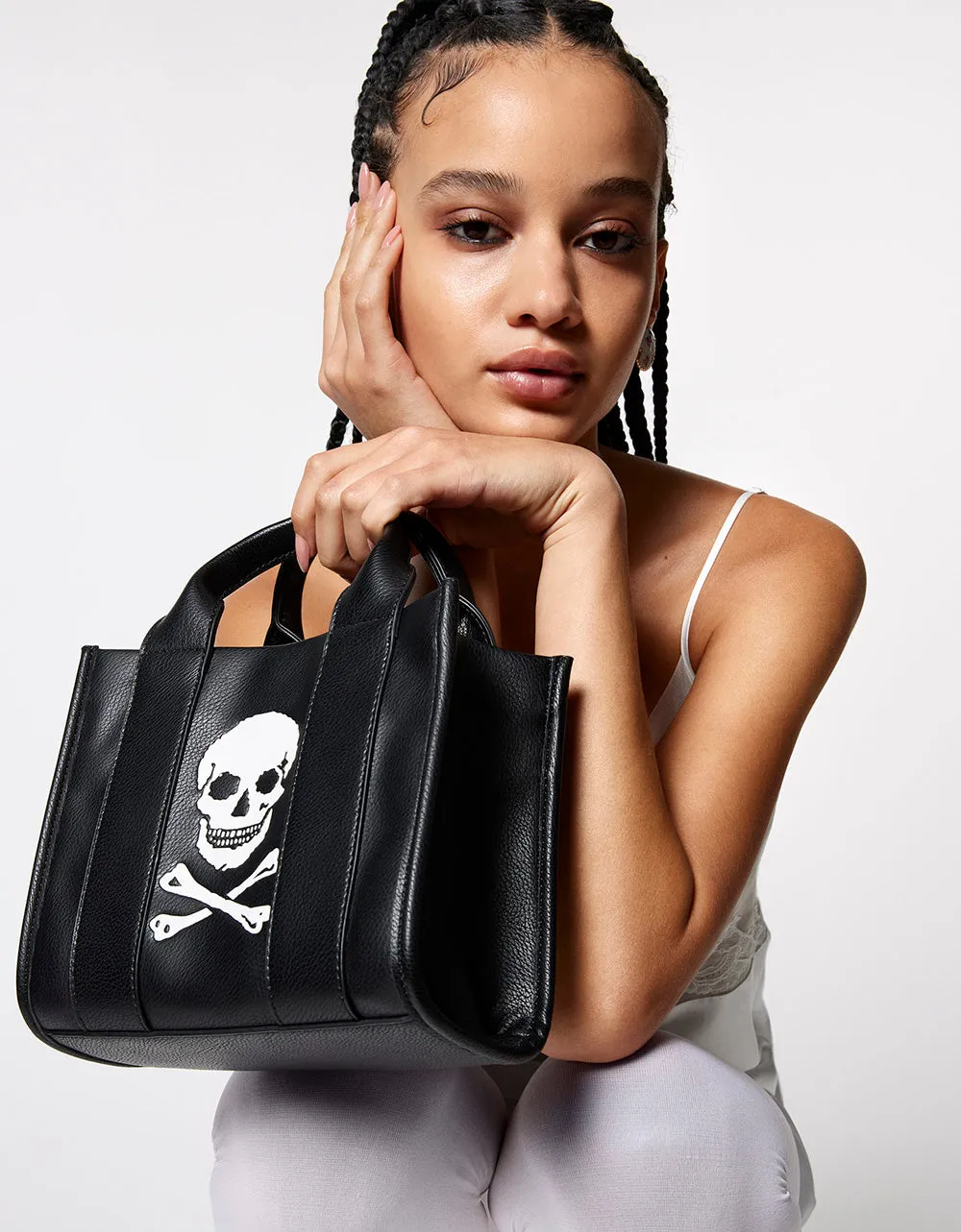 SKULLY DEBOSS MINI TOTE BLACK sold by Betsey Johnson