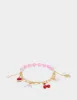 BETSEYS POOL PARTY DOLPHIN STRETCH BRACELET PINK sold by Betsey Johnson