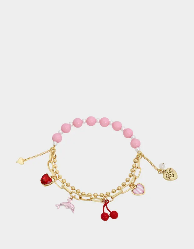 BETSEYS POOL PARTY DOLPHIN STRETCH BRACELET PINK sold by Betsey Johnson