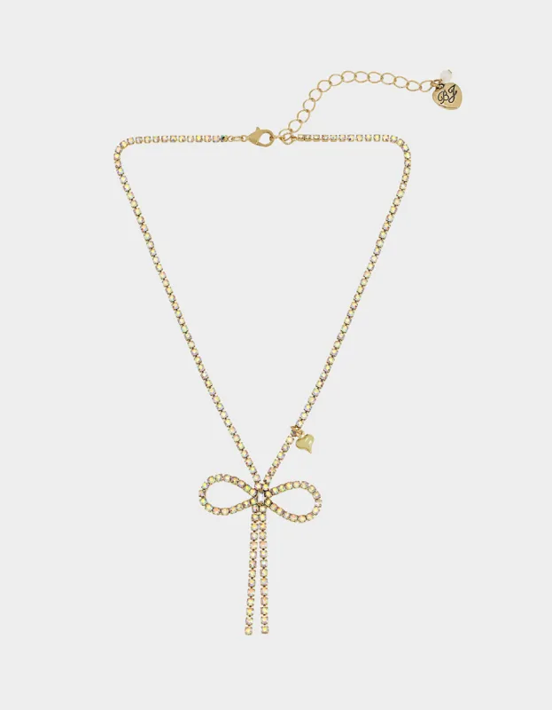 BOW PENDANT GOLD sold by Betsey Johnson