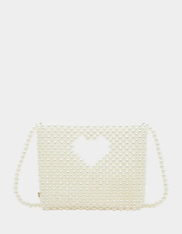 GOSSIP PEARL TOP HANDLE CROSSBODY PEARL sold by Betsey Johnson