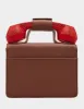 KITSCH GINGERBREAD PHONE BAG BROWN sold by Betsey Johnson