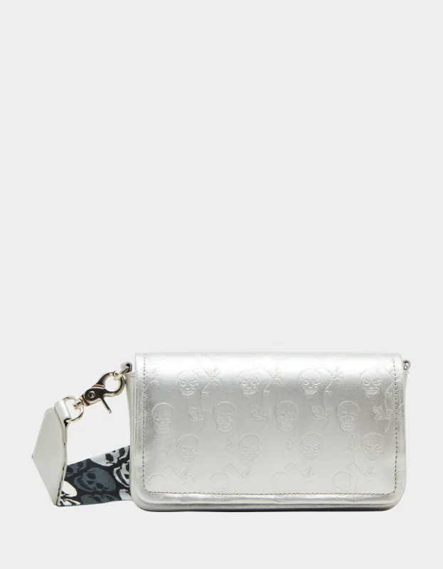 SKULLS & ROSES CROSSBODY SILVER sold by Betsey Johnson