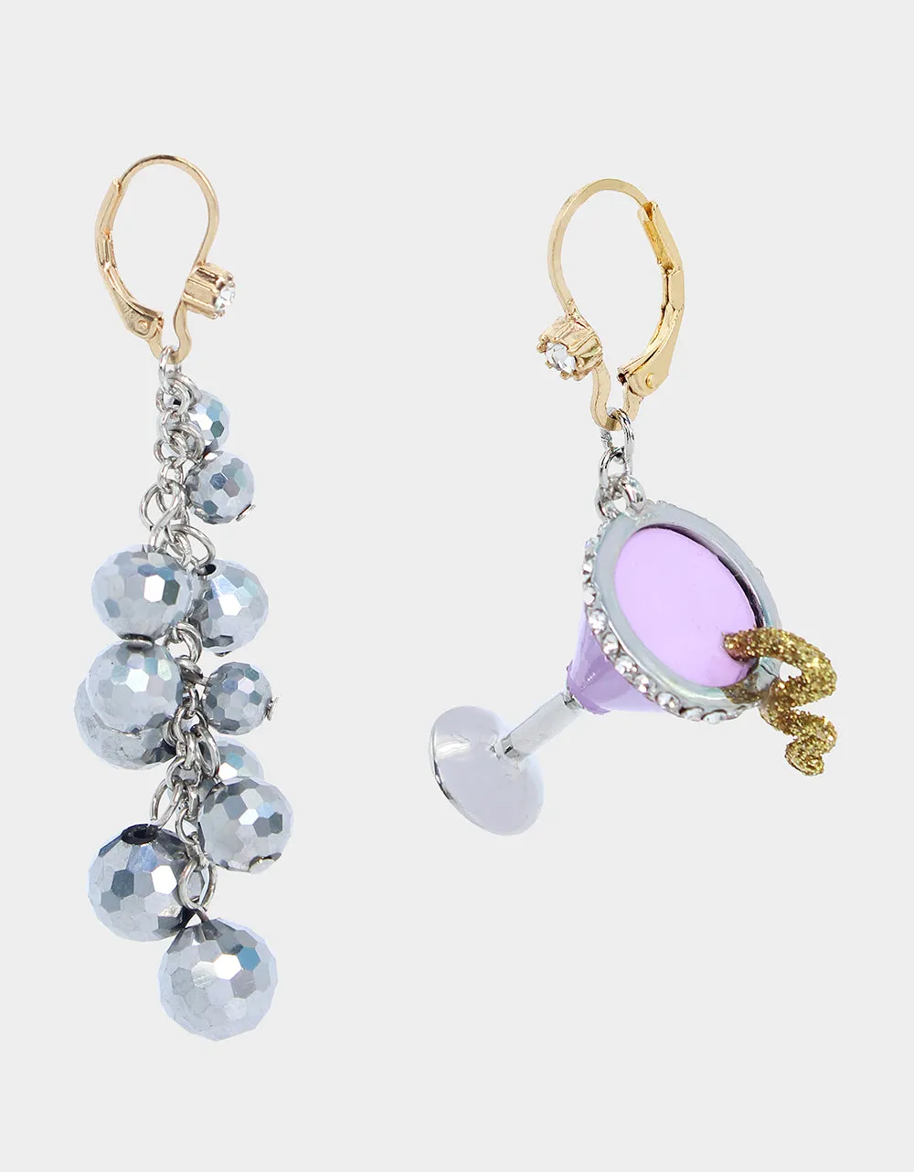 MIDNIGHT MAGIC MARTINI MISMATCH EARRINGS PURPLE sold by Betsey Johnson