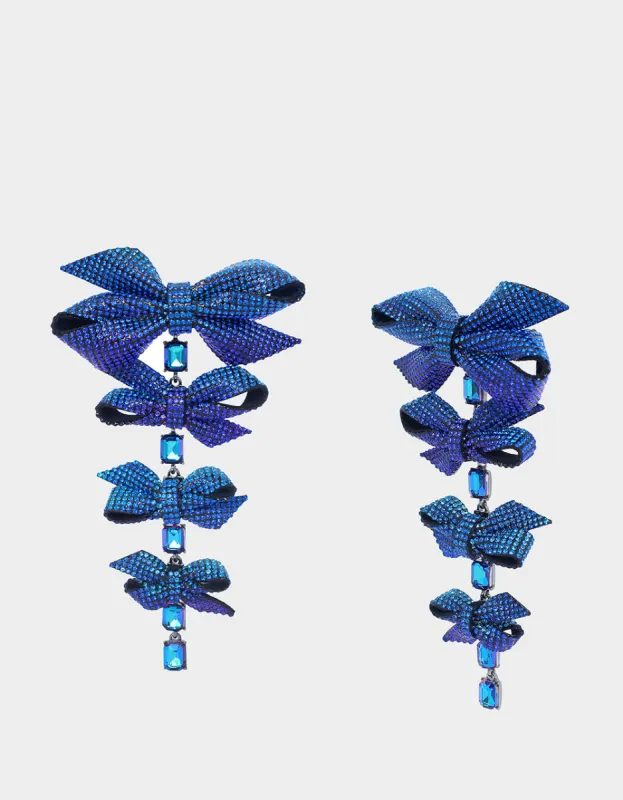 BLUE BOWS PAVE BOW LINEAR EARRINGS BLUE sold by Betsey Johnson