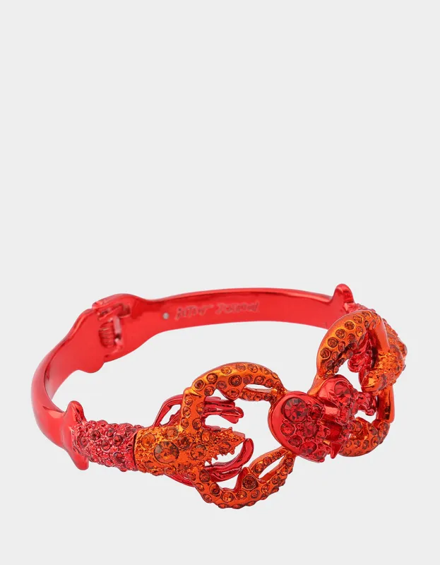 MERMAID JEWELS LOBSTER HINGE BYPASS BRACELET RED sold by Betsey Johnson
