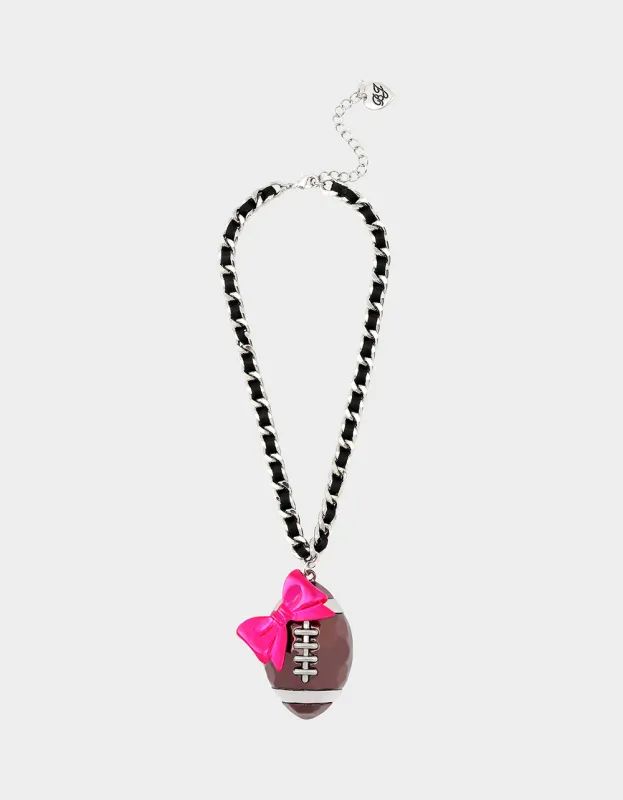 RIBBON FOOTBALL PENDANT PINK sold by Betsey Johnson