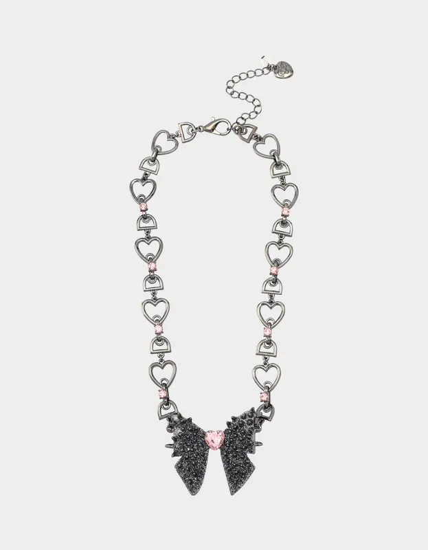 SPIKY BOW SHORT PENDANT PINK sold by Betsey Johnson